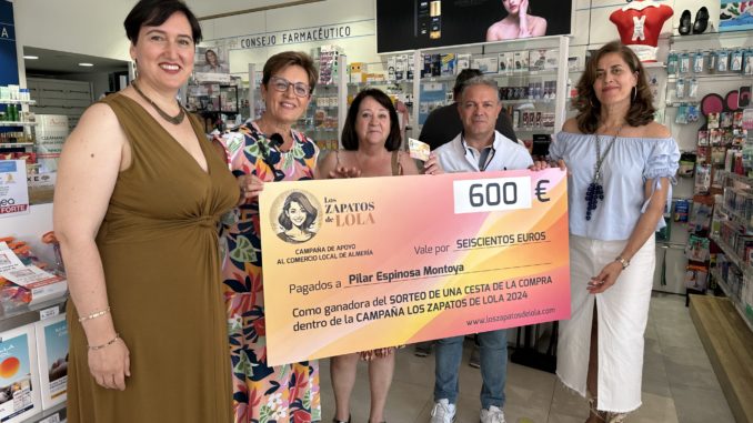 ganadora cheque Zapatos Lola